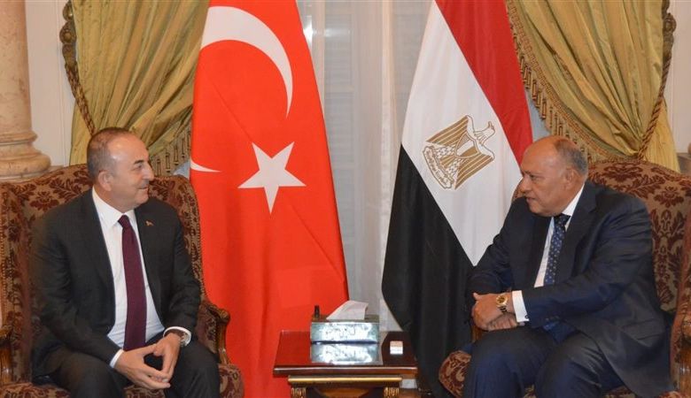 وزير الخارجية التركى أوغلو مع سامح شكرى وزير الخارجية